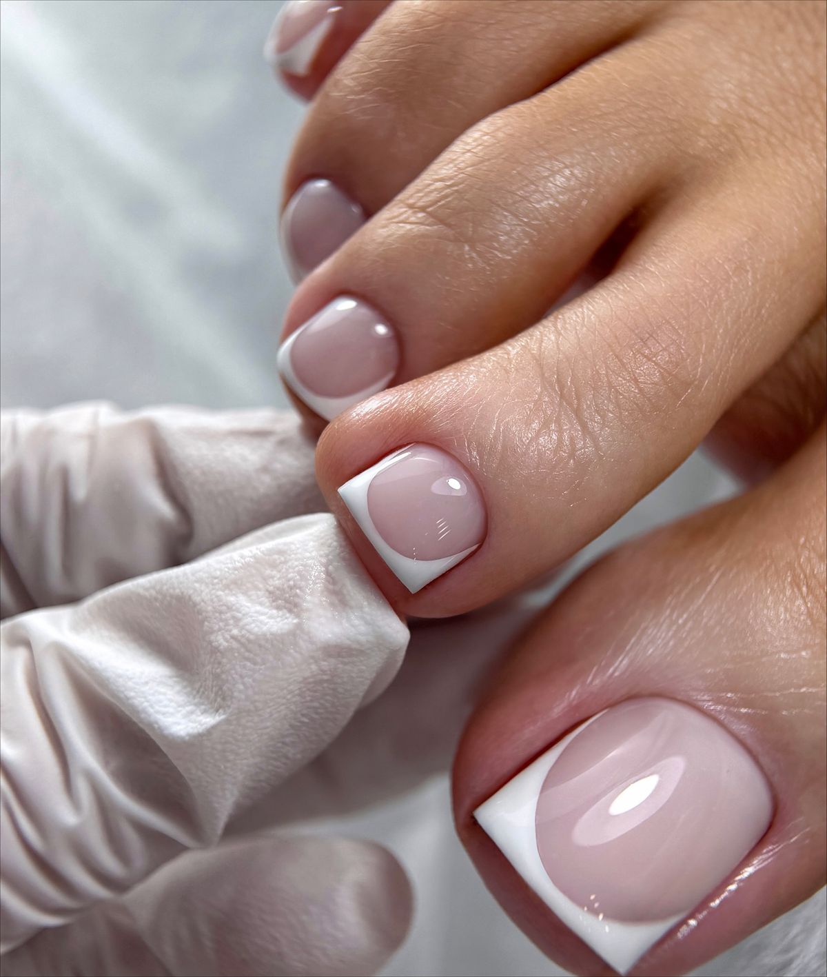 French pedicure with delicate floral toe nail art