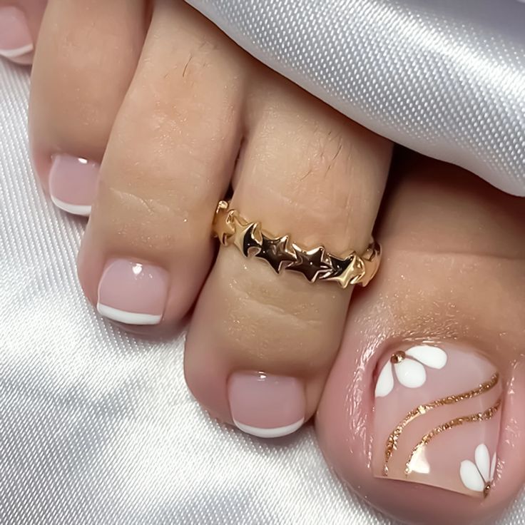 French pedicure with delicate floral toe nail art